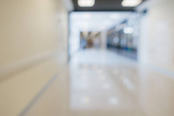istock blur image background of corridor office hospital walkway 1008107526