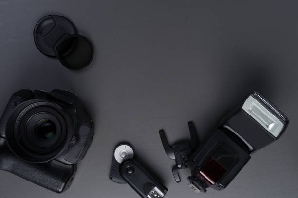 istock Photography concept with dslr lense flash and acessories 1008107838