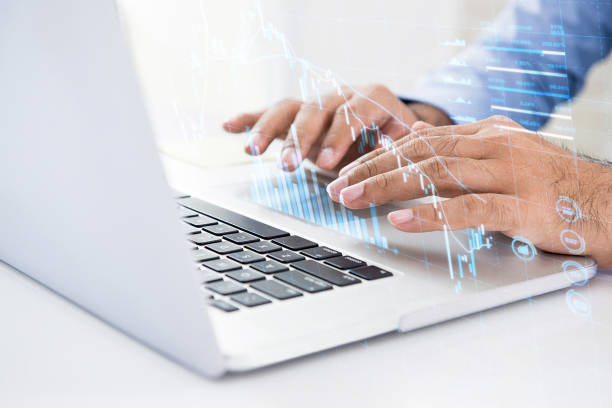 istock Businessman using computer searching for digital data of stock for investment 1008108242