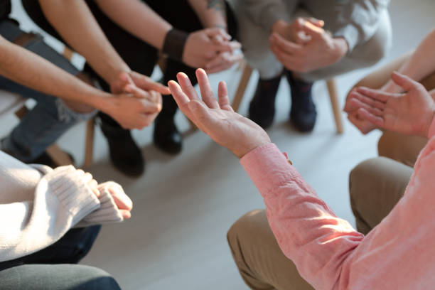 istock Close-up of therapist's hands explaining a problem to his patients 1008118456