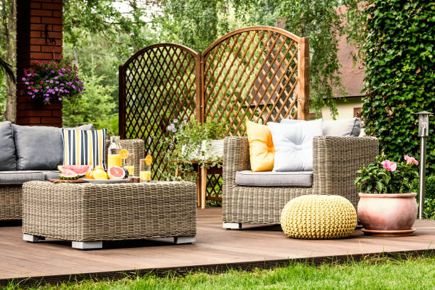 istock Wooden terrace with yellow pouf 1008118466