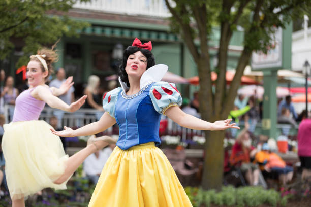Frankenmuth, Michigan, USA - June 10, 2018 Members of Everafter West Michigan dress up as disney princess at the Bavarian Festival Parade.