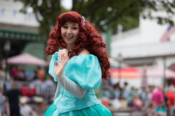Frankenmuth, Michigan, USA - June 10, 2018 Members of Everafter West Michigan dress up as disney princess at the Bavarian Festival Parade.