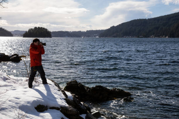 istock Photographer taking pictures 1008174704