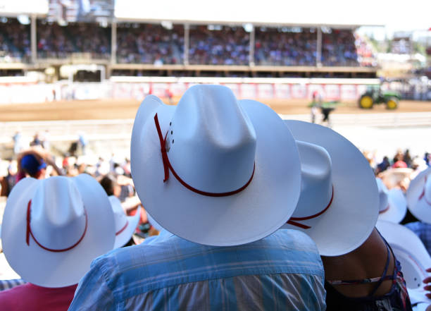 Cowboy hats at rodeo stock photo