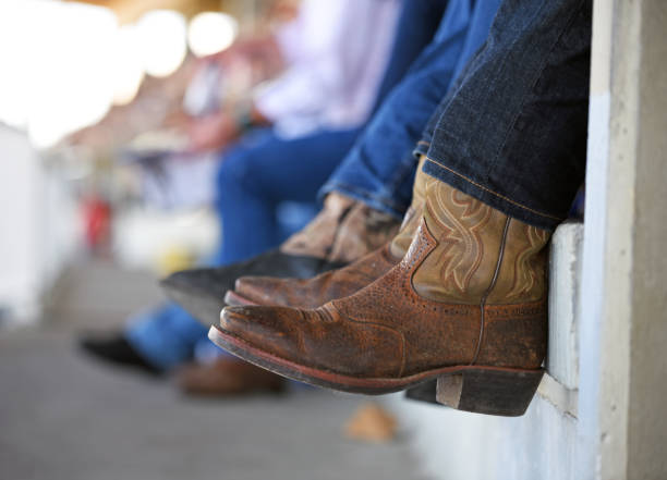 Cowboy boots at rodeo stock photo