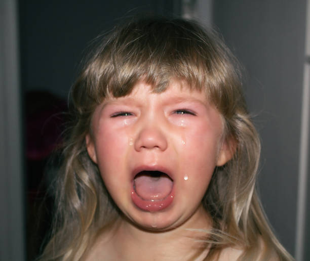 istock Little baby hysterically crying 1008197244