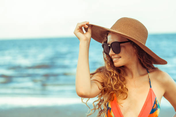istock Happy young woman at beach in summer vacation. 1008212894