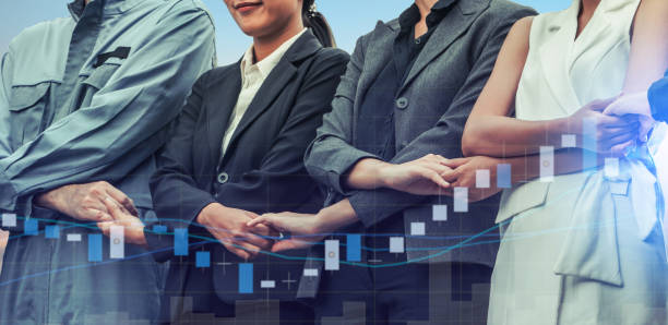 istock Double exposure business people holding hands. 1008220734