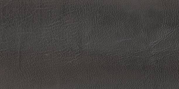 istock The structure of the black leather sheet (long) 1008225934