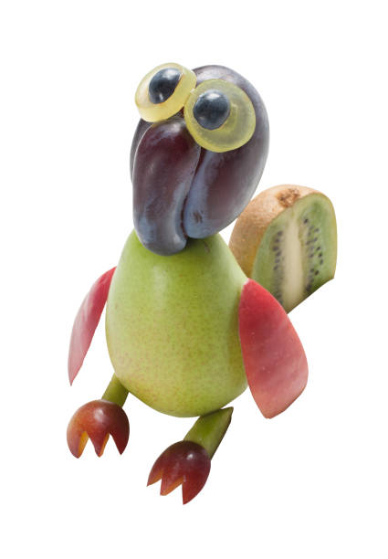 istock Parrot made with pear, plum and kiwi 1008226072