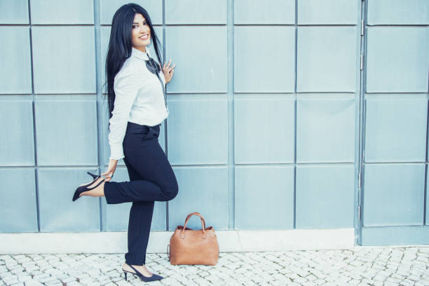 istock Playful businesswoman enjoying stroll after work 1008229032