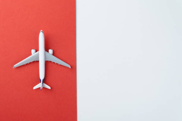 istock Airplane on blue pastel color background 1008241466