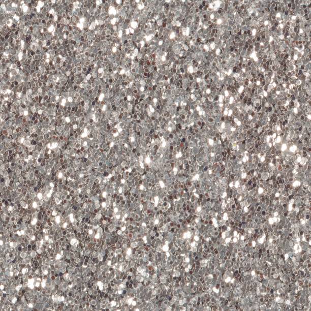 istock Silver glitter sparkle. Background for your design. Seamless squ 1008244098