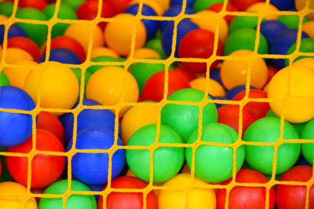 istock Background of colored balls for playing children 1008249018