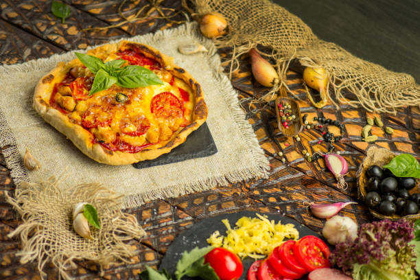 istock Margarita pizza with ham mushrooms and ketchup 1008253430