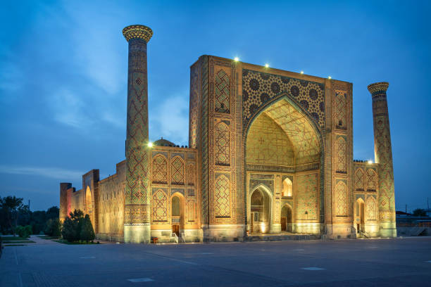 istock Ulugh Beg Madrasah at dusk in Samarkand, Uzbekistan 1008263662