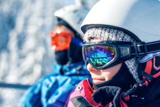istock Little skiers on the ski lift 1008263852