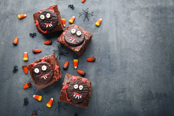 istock Fresh halloween cookies with candy corns on grey wooden table 1008278622