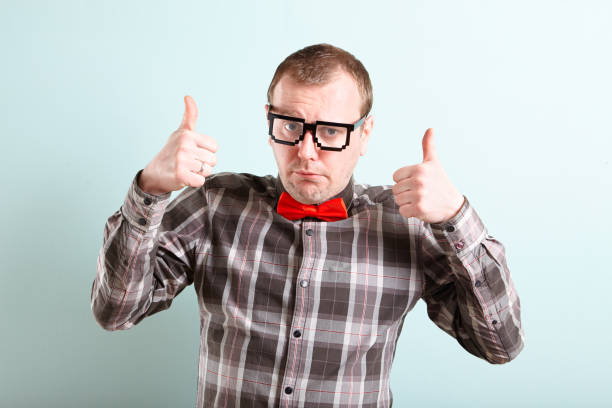 istock Happy male holding thumbs up 1008284578
