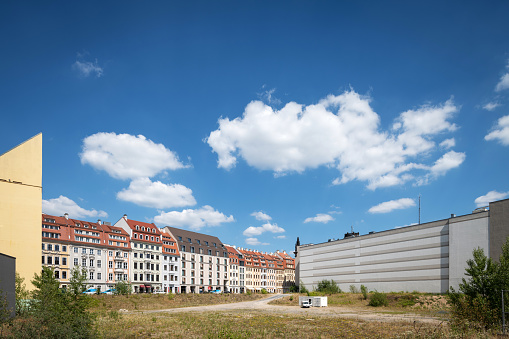 Dresden, Germany - July 24, 2018: View of the last gap between buildings on Dresdner Neumarkt, which is to be built at the end of the year. In the area between Rampische Street and Landhausstreet apartments and shops are to be created.