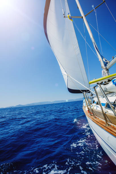 istock Sailing. Ship yachts with white sails in the open Sea 1008287930