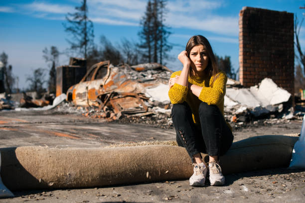 istock Ruins after fire disaster, loss and despair concept. 1008290394