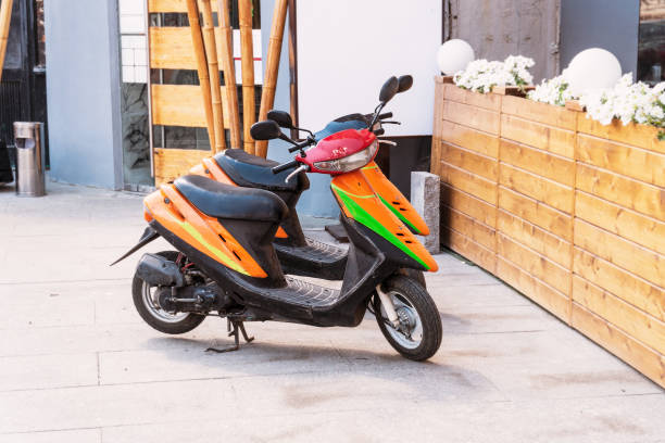 istock Two parked a scooter standing near the wall 1008305110