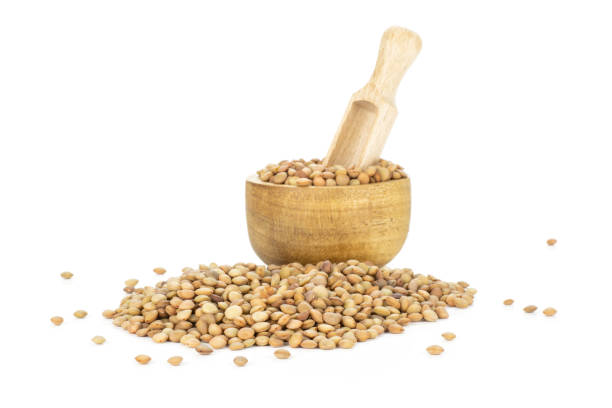 istock Raw green lentil seeds isolated on white 1008312472