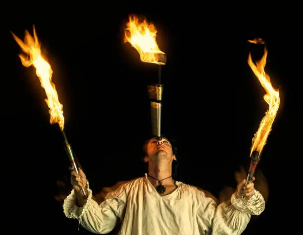 Photo of Fire eater doing fire performance