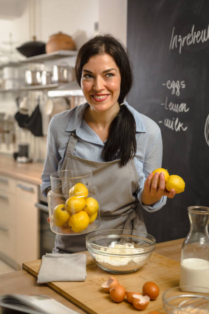 istock Woman preparingsweet pie in her kitchen 1008331544
