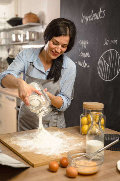 istock Woman preparingsweet pie in her kitchen 1008331774