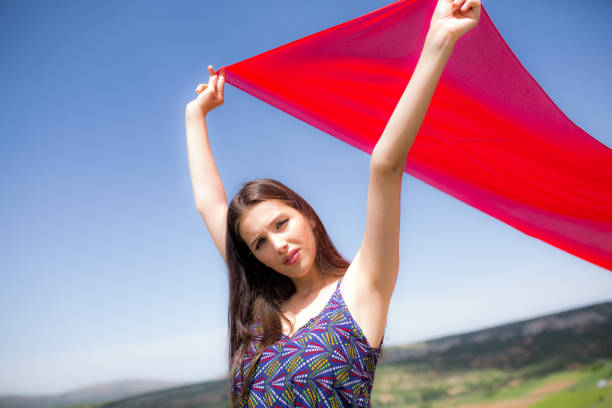 istock a young woman in the spring 1008336434