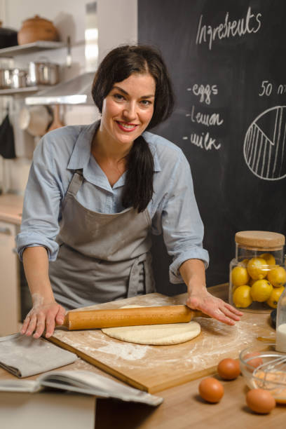 istock Woman preparingsweet pie in her kitchen 1008336732