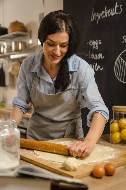 istock Woman preparingsweet pie in her kitchen 1008340852