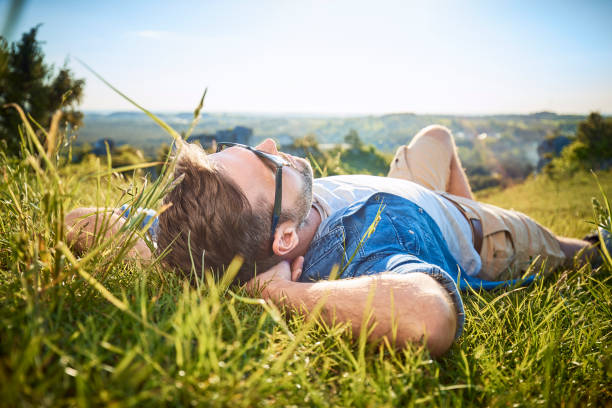 istock Man relaxing during hiking trip in the mountains 1008363086