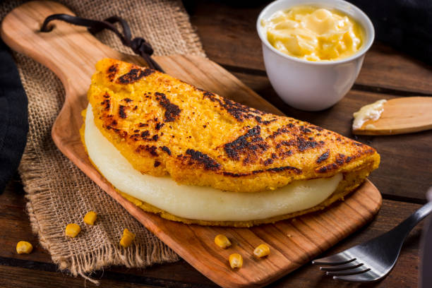 istock Cachapa with cheese, typical Venezuelan dish made with corn, cheese and butter 1008376196
