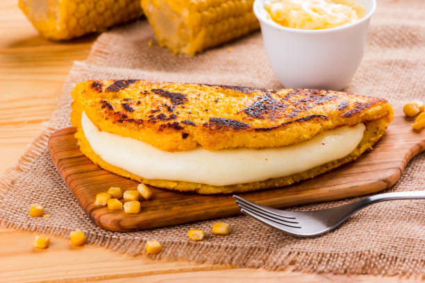 istock Cachapa with cheese, typical Venezuelan dish made with corn, cheese and butter 1008379100