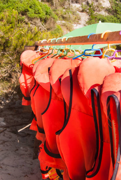 istock Line of orange life jackets 1008379606