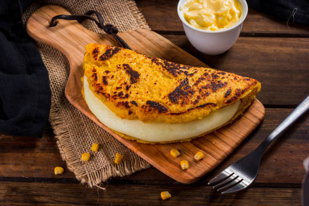 istock Cachapa with cheese, typical Venezuelan dish made with corn, cheese and butter 1008380090