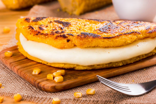 istock Cachapa with cheese, typical Venezuelan dish made with corn, cheese and butter 1008387072