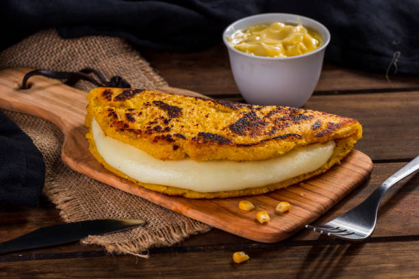 istock Cachapa with cheese, typical Venezuelan dish made with corn, cheese and butter 1008389192