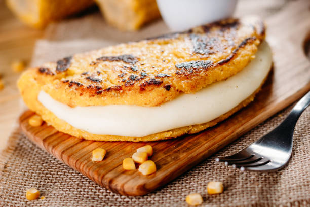 Cachapa with cheese, typical Venezuelan dish made with corn, cheese and butter stock photo