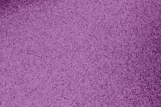 istock Glittering background with blur effect in purple color. 1008392834