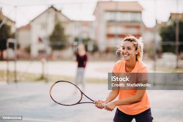 Womens Doubles Match Tennis Volley Stock Photo - Download Image Now - Tennis, Healthy Lifestyle, Racket