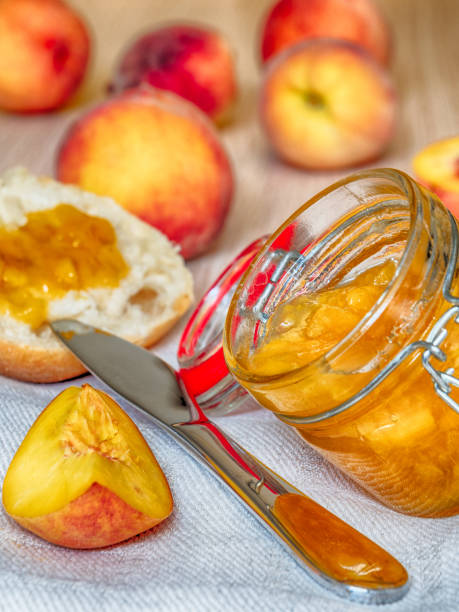istock Jar of homemade peach jam 1008405970
