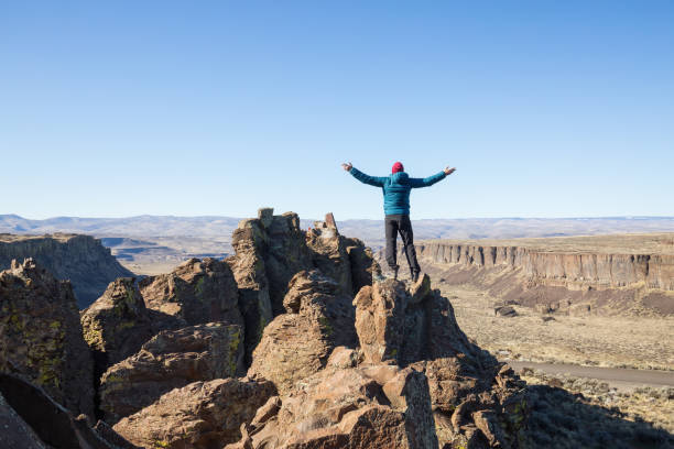 istock Man on top of Mountain 1008412918