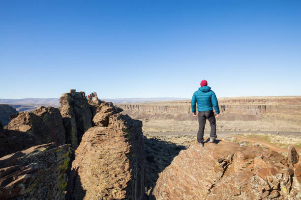 istock Man on top of Mountain 1008412922