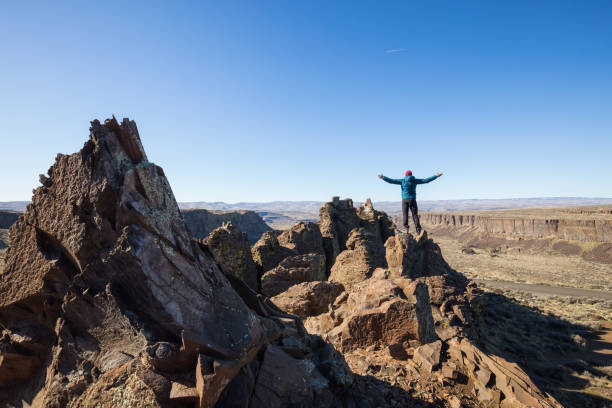 istock Man on top of Mountain 1008412924