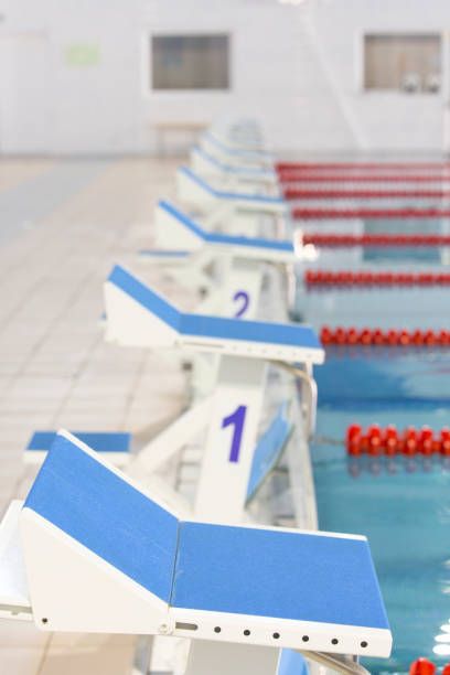 istock Start position with number 1 in competition swimming pool 1008419778